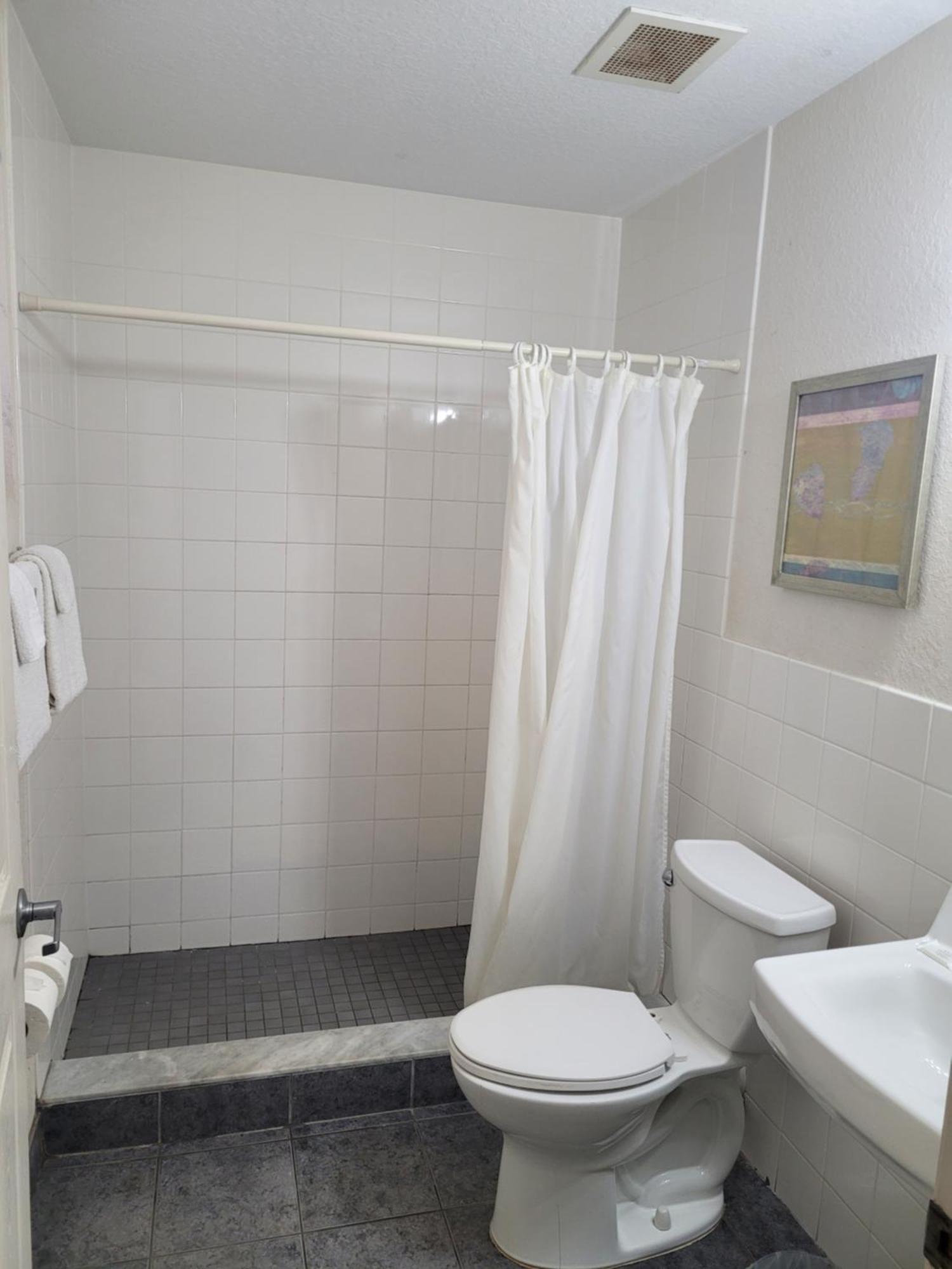 Queens Lodge Motel ウェストパームビーチ エクステリア 写真